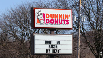 SUNBURY, PENNSYLVANIA, UNITED STATES - 2023/03/26: A sign with the Dunkin' Donuts logo is seen at its restaurant along North 4th Street in Sunbury, Pa. (Photo by Paul Weaver/SOPA Images/LightRocket via Getty Images)