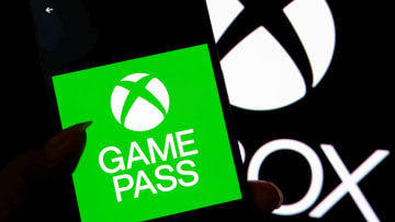 INDIA - 2023/07/25: In this photo illustration, a Xbox Game logo is seen displayed on a smartphone with a Xbox logo in the background. (Photo Illustration by Avishek Das/SOPA Images/LightRocket via Getty Images)