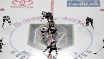 LAS VEGAS, NV - OCTOBER 10: The opening faceoff is taken between the Vegas Golden Knights and the Arizona Coyotes during the Golden Knights' inaugural regular-season home opener at T-Mobile Arena on October 10, 2017 in Las Vegas, Nevada. (Photo by David Becker/NHLI via Getty Images)