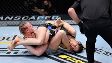 LAS VEGAS, NEVADA - AUGUST 29: (R-L) Polyana Viana of Brazil secures an arm bar submission against Emily Whitmire in their strawweight fight during the UFC Fight Night event at UFC APEX on August 29, 2020 in Las Vegas, Nevada. (Photo by Jeff Bottari/Zuffa LLC)