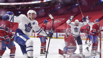 MONTREAL, QC - MAY 24: Morgan Rielly #44 of the Toronto Maple Leafs celebrates his goal near Carey Price #31 of the Montreal Canadiens during the second period in Game Three of the First Round of the 2021 Stanley Cup Playoffs at the Bell Centre on May 24, 2021 in Montreal, Canada. The Toronto Maple Leafs defeated the Montreal Canadiens 2-1. (Photo by Minas Panagiotakis/Getty Images)