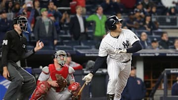 Sep 28, 2016; Bronx, NY, USA; New York Yankees first baseman Mark Teixeira (25) hits a walk off grand slam against the Boston Red Sox during the ninth inning at Yankee Stadium. Mandatory Credit: Brad Penner-USA TODAY Sports