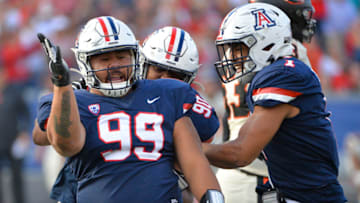 Nov 2, 2019; Tucson, AZ, USA; Arizona Wildcats defensive lineman Myles Tapusoa (99) celebrates after a sack during the second half against the Oregon State Beavers at Arizona Stadium. Mandatory Credit: Casey Sapio-USA TODAY Sports