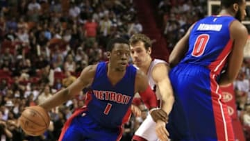 Mar 29, 2015; Miami, FL, USA; Detroit Pistons guard Reggie Jackson (1) dribbles the ball as Miami Heat guard Goran Dragic (7) goes around center Andre Drummond (0) in the second half at American Airlines Arena. The Heat won 109-102. Mandatory Credit: Robert Mayer-USA TODAY Sports