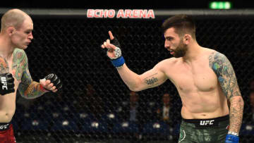 LIVERPOOL, ENGLAND - MAY 27: (R-L) Carlo Pedersoli taunts Bradley Scott of England in their welterweight bout during the UFC Fight Night event at ECHO Arena on May 27, 2018 in Liverpool, England. (Photo by Josh Hedges/Zuffa LLC/Zuffa LLC via Getty Images)