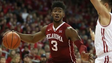 Dec 3, 2016; Madison, WI, USA; Oklahoma Sooners guard Christian James (3) works the ball against Wisconsin Badgers guard Bronson Koenig (right) at the Kohl Center. Wisconsin defeated Oklahoma 90-70. Mandatory Credit: Mary Langenfeld-USA TODAY Sports