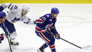 Amerks Mason Jobst pushes the puck up the ice.