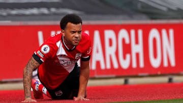 Southampton's English defender Ryan Bertrand hits the deck during the English Premier League football match between Southampton and Brighton and Hove Albion at St Mary's Stadium in Southampton, southern England on March 14, 2021. - RESTRICTED TO EDITORIAL USE. No use with unauthorized audio, video, data, fixture lists, club/league logos or 'live' services. Online in-match use limited to 120 images. An additional 40 images may be used in extra time. No video emulation. Social media in-match use limited to 120 images. An additional 40 images may be used in extra time. No use in betting publications, games or single club/league/player publications. (Photo by ANDREW COULDRIDGE / POOL / AFP) / RESTRICTED TO EDITORIAL USE. No use with unauthorized audio, video, data, fixture lists, club/league logos or 'live' services. Online in-match use limited to 120 images. An additional 40 images may be used in extra time. No video emulation. Social media in-match use limited to 120 images. An additional 40 images may be used in extra time. No use in betting publications, games or single club/league/player publications. / RESTRICTED TO EDITORIAL USE. No use with unauthorized audio, video, data, fixture lists, club/league logos or 'live' services. Online in-match use limited to 120 images. An additional 40 images may be used in extra time. No video emulation. Social media in-match use limited to 120 images. An additional 40 images may be used in extra time. No use in betting publications, games or single club/league/player publications. (Photo by ANDREW COULDRIDGE/POOL/AFP via Getty Images)
