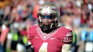 Nov 29, 2014; Tallahassee, FL, USA; Florida State Seminoles running back Dalvin Cook (4) warms up before the start of the game against the Florida Gators at Doak Campbell Stadium. Mandatory Credit: Melina Vastola-USA TODAY Sports