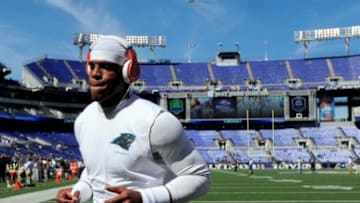 Sep 28, 2014; Baltimore, MD, USA; Carolina Panthers quarterback Cam Newton (1) warms up prior to the game against the Baltimore Ravens at M&T Bank Stadium. Mandatory Credit: Evan Habeeb-USA TODAY Sports