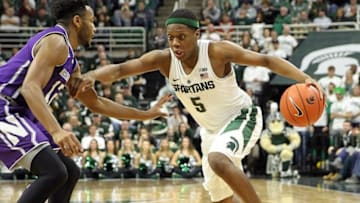 Dec 30, 2016; East Lansing, MI, USA; Michigan State Spartans guard Cassius Winston (5) drives to the basket during the first half against the Northwestern Wildcats at Jack Breslin Student Events Center. Mandatory Credit: Mike Carter-USA TODAY Sports