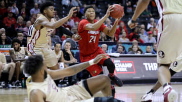 NEW YORK, NY - MARCH 07: Dwayne Sutton #24 of the Louisville Cardinals moves with the ball against the Florida State Seminoles in the second half during the second round of the ACC Men's Basketball Tournament at Barclays Center on March 7, 2018 in New York City. (Photo by Abbie Parr/Getty Images)