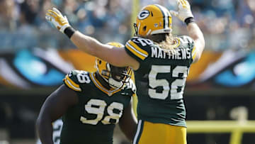 Sep 11, 2016; Jacksonville, FL, USA; Green Bay Packers defensive end Letroy Guion (98) and inside linebacker Clay Matthews (52) celebrate as they beat the Jacksonville Jaguars during the second half at EverBank Field. Green Bay Packers defeated the Jacksonville Jaguars 27-23. Mandatory Credit: Kim Klement-USA TODAY Sports