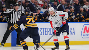 Mar 9, 2020; Buffalo, New York, USA; Washington Capitals left wing Ilya Kovalchuk (17) looks to make a pass as Buffalo Sabres defenseman Rasmus Dahlin (26) defends during the third period at KeyBank Center. Mandatory Credit: Timothy T. Ludwig-USA TODAY Sports
