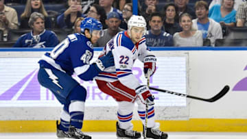 TAMPA, FL - NOVEMBER 02: New York Rangers defender Kevin Shattenkirk (22) is closely defended by Tampa Bay Lightning center Gabriel Dumont (40) during the first period of an NHL game between the New York Rangers and the Tampa Bay Lightning on November 02, 2017 at Amalie Arena in Tampa, FL. (Photo by Roy K. Miller/Icon Sportswire via Getty Images)