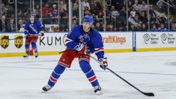 Dec 6, 2015; New York, NY, USA; New York Rangers center Oscar Lindberg (24) shoots the puck against the Ottawa Senators at Madison Square Garden. Mandatory Credit: Vincent Carchietta-USA TODAY Sports