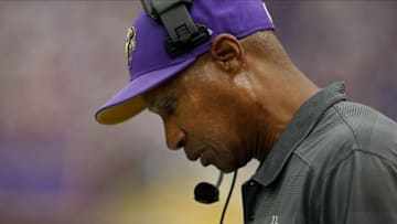 Sep 22, 2013; Minneapolis, MN, USA; Minnesota Vikings head coach Leslie Frazier talks on his radio during the game with the Cleveland Browns at Mall of America Field at H.H.H. Metrodome. The Browns win 31-27. Mandatory Credit: Bruce Kluckhohn-USA TODAY Sports