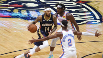 NEW ORLEANS, LOUISIANA - JANUARY 06: Brandon Ingram #14 of the New Orleans Pelicans drives the ball around Shai Gilgeous-Alexander #2 of the Oklahoma City Thunder (Photo by Chris Graythen/Getty Images)