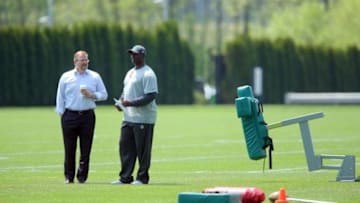 May 8, 2015; Florham Park, NY, USA; New York Jets general manager Mike Maccagnan (left) and head coach Todd Bowles watch rookie minicamp at the Atlantic Health Jets Training Center. Mandatory Credit: Brad Penner-USA TODAY Sports