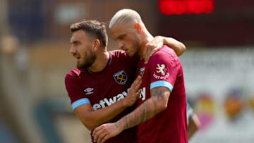 HIGH WYCOMBE, ENGLAND - JULY 14: Marko Arnautovic celebrates with team-mate Robert Snodgrass of West Ham after scoring the opening goal during the pre-season friendly match between Wycombe Wanderers and West Ham United at Adams Park on July 14, 2018 in High Wycombe, England. (Photo by Dan Istitene/Getty Images)