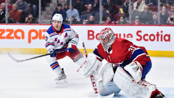 MONTREAL, QC - FEBRUARY 27: Goaltender Carey Price #31 of the Montreal Canadiens tends goal near Jesper Fast #17 of the New York Rangers during the first period at the Bell Centre on February 27, 2020 in Montreal, Canada. The New York Rangers defeated the Montreal Canadiens 5-2. (Photo by Minas Panagiotakis/Getty Images)