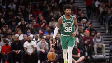 TORONTO, ON - MARCH 28: Marcus Smart #36 of the Boston Celtics dribbles during the second half of their NBA game against the Toronto Raptors at Scotiabank Arena on March 28, 2022 in Toronto, Canada. NOTE TO USER: User expressly acknowledges and agrees that, by downloading and or using this Photograph, user is consenting to the terms and conditions of the Getty Images License Agreement. (Photo by Cole Burston/Getty Images)