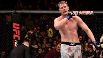 LONDON, ENGLAND - MARCH 17: (R-L) Alexander Volkov of Russia reacts after defeating Fabricio Werdum of Brazil in their heavyweight bout inside The O2 Arena on March 17, 2018 in London, England. (Photo by Brandon Magnus/Zuffa LLC/Zuffa LLC via Getty Images)