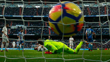 MADRID, SPAIN - JANUARY 21: Cristiano Ronaldo of Real Madrid CF falls to the ground after scoring their sixth goal during the La Liga match between Real Madrid CF and Deportivo La Coruna at Estadio Santiago Bernabeu on January 21, 2018 in Madrid, Spain. (Photo by Gonzalo Arroyo Moreno/Getty Images)