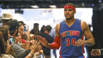 Apr 6, 2016; Orlando, FL, USA; Detroit Pistons forward Tobias Harris (34) greets fans in the locker room tunnel against the Orlando Magic after a basketball game at Amway Center. The Pistons won 108-104. Mandatory Credit: Reinhold Matay-USA TODAY Sports