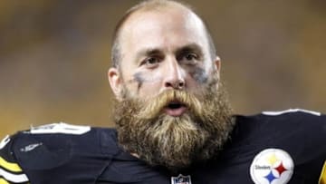 Aug 24, 2013; Pittsburgh, PA, USA; Pittsburgh Steelers defensive end Brett Keisel (99) reacts on the sidelines against the Kansas City Chiefs during the fourth quarter at Heinz Field. The Kansas City Chiefs won 26-20 in overtime. Mandatory Credit: Charles LeClaire-USA TODAY Sports