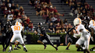 COLUMBIA, SOUTH CAROLINA - SEPTEMBER 26: Quarterback Collin Hill #15 of the South Carolina Gamecocks rolls out of the pocket against the Tennessee Volunteers during the football game at Williams-Brice Stadium on September 26, 2020 in Columbia, South Carolina. (Photo by Mike Comer/Getty Images)