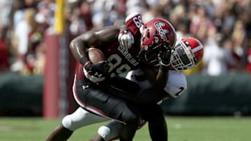 COLUMBIA, SC - SEPTEMBER 08: Richard LeCounte #2 of the Georgia Bulldogs stops Bryan Edwards #89 of the South Carolina Gamecocks during their game at Williams-Brice Stadium on September 8, 2018 in Columbia, South Carolina. (Photo by Streeter Lecka/Getty Images)