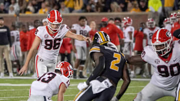 Oct 1, 2022; Columbia, Missouri, USA; Georgia Bulldogs place kicker Jack Podlesny (96) kicks a point after touchdown against the Missouri Tigers during the first half at Faurot Field at Memorial Stadium. Mandatory Credit: Denny Medley-USA TODAY Sports
