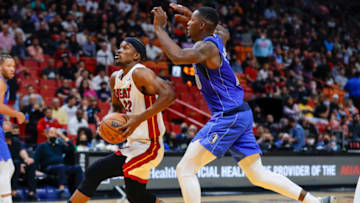 Miami Heat forward Jimmy Butler (22) drives in front of Dallas Mavericks forward Dorian Finney-Smith (10)(Sam Navarro-USA TODAY Sports)