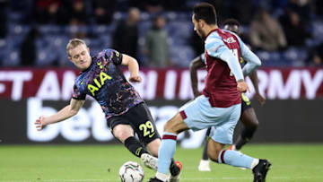 BURNLEY, ENGLAND - OCTOBER 27: Oliver Skipp of Tottenham Hotspur tackles Dwight McNeil of Burnley during the Carabao Cup Round of 16 match between Burnley and Tottenham Hotspur at Turf Moor on October 27, 2021 in Burnley, England. (Photo by George Wood/Getty Images)
