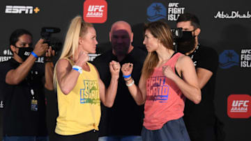 ABU DHABI, UNITED ARAB EMIRATES - OCTOBER 02: In this handout image provided by UFC, (L-R) Opponents Holly Holm and Irene Aldana of Mexico face off during the UFC Fight Night weigh-in on October 02, 2020 in Abu Dhabi, United Arab Emirates. (Photo by Josh Hedges/Zuffa LLC via Getty Images)