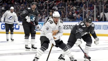 ST LOUIS, MISSOURI - JANUARY 25: David Pastrnak #88 of the Boston Bruins plays the puck against Max Pacioretty #67 of the Vegas Golden Knights during the 2020 NHL All-Star Game between the Atlantic Division and Pacific Division at the Enterprise Center on January 25, 2020 in St Louis, Missouri. (Photo by Scott Rovak/NHLI via Getty Images)