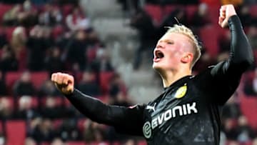 18 January 2020, Bavaria, Augsburg: Football: Bundesliga, FC Augsburg - Borussia Dortmund, 18th matchday, WWK-Arena. Dortmund's Erling Haaland cheers. Photo: Stefan Puchner/dpa - IMPORTANT NOTE: In accordance with the regulations of the DFL Deutsche Fußball Liga and the DFB Deutscher Fußball-Bund, it is prohibited to exploit or have exploited in the stadium and/or from the game taken photographs in the form of sequence images and/or video-like photo series. (Photo by Stefan Puchner/picture alliance via Getty Images)