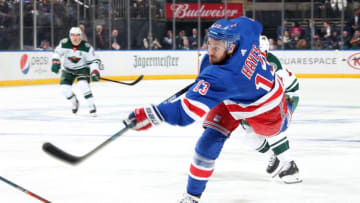 NEW YORK, NY - FEBRUARY 21: Kevin Hayes #13 of the New York Rangers shoots the puck against the Minnesota WIld at Madison Square Garden on February 21, 2019 in New York City. (Photo by Jared Silber/NHLI via Getty Images)
