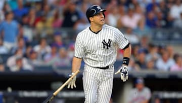 Aug 3, 2016; Bronx, NY, USA; New York Yankees first baseman Mark Teixeira (25) hits a three run home run against the New York Mets during the second inning at Yankee Stadium. Mandatory Credit: Brad Penner-USA TODAY Sports