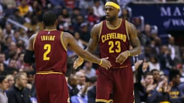 Feb 20, 2015; Washington, DC, USA; Cleveland Cavaliers forward LeBron James (23) celebrates with guard Kyrie Irving (2) against the Washington Wizards in the third quarter at Verizon Center. The Cavaliers won 127-89. Mandatory Credit: Geoff Burke-USA TODAY Sports