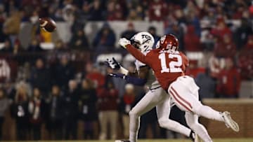 Nov 21, 2015; Norman, OK, USA; TCU Horned Frogs wide receiver KaVontae Turpin (25) catches a pass past Oklahoma Sooners cornerback William Johnson (12) during the second half at Gaylord Family - Oklahoma Memorial Stadium. Mandatory Credit: Kevin Jairaj-USA TODAY Sports