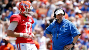 Apr 12, 2014; Gainesville, FL, USA; Florida Gators head coach Will Muschamp looks on with quarterback Skyler Mornhinweg (17) during the first half of the spring game at Ben Hill Griffin Stadium. Mandatory Credit: Rob Foldy-USA TODAY Sports