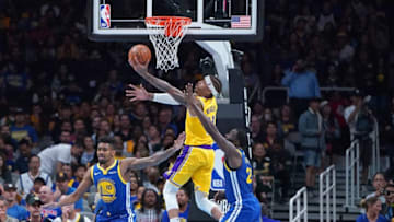 SAN JOSE, CA - OCTOBER 12: Michael Beasley #11 of the Los Angeles Lakers goes in for a layup over Draymond Green #23 and Jacob Evans #10 of the Golden State Warriors during the seccond half of their NBA preseason basketball game at SAP Center on October 12, 2018 in San Jose, California. NOTE TO USER: User expressly acknowledges and agrees that, by downloading and or using this photograph, User is consenting to the terms and conditions of the Getty Images License Agreement. (Photo by Thearon W. Henderson/Getty Images)