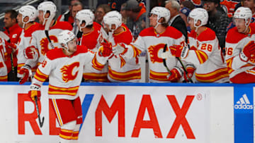 Oct 15, 2022; Edmonton, Alberta, CAN; The Calgary Flames celebrate a goal scored by forward Andrew Mangiapane (88) during the first period against the Edmonton Oilers at Rogers Place. Mandatory Credit: Perry Nelson-USA TODAY Sports