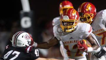 Auburn footballLake Charles Trailblazer Trevonte Citizen (12) tries to get around Germantown's Andrew Dinkelacker (47) during play at Germantown Friday, Sept. 3, 2021.Tcl Germantown Lake Charles