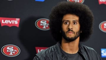 Sep 1, 2016; San Diego, CA, USA; San Francisco 49ers quarterback Colin Kaepernick (7) looks on during a press conference following the game against the San Diego Chargers at Qualcomm Stadium. San Francisco won 31-21. Mandatory Credit: Orlando Ramirez-USA TODAY Sports