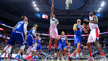 WASHINGTON, DC - NOVEMBER 20: Bradley Beal #3 of the Washington Wizards shoots in front of Avery Bradley #11 of the LA Clippers during the first half at Capital One Arena on November 20, 2018 in Washington, DC. NOTE TO USER: User expressly acknowledges and agrees that, by downloading and or using this photograph, User is consenting to the terms and conditions of the Getty Images License Agreement. (Photo by Will Newton/Getty Images)