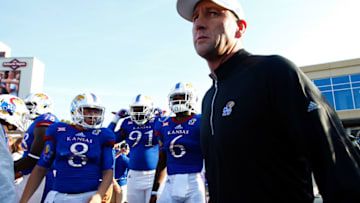 LAWRENCE, KS - SEPTEMBER 12: Head coach David Beaty and the Kansas Jayhawks run onto the field prior to the game against the Memphis Tigers at Memorial Stadium on September 12, 2015 in Lawrence, Kansas. (Photo by Jamie Squire/Getty Images)