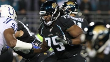 November 8, 2012; Jacksonville FL, USA; Jacksonville Jaguars tackle Eugene Monroe (75) blocks during the first quarter against the Indianapolis Colts at EverBank Field. Mandatory Credit: Kim Klement-USA TODAY Sports